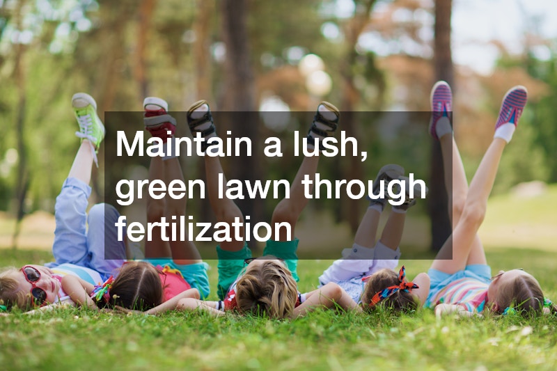 children lying down on a lush green lawn